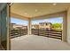 Large covered balcony offering views of the neighborhood and mountains at 767 Tallgrass St, Las Vegas, NV 89138