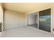 Outdoor balcony with views into the house through the sliding glass doors at 767 Tallgrass St, Las Vegas, NV 89138