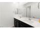 Bathroom features dual sinks, modern fixtures, and ample lighting at 767 Tallgrass St, Las Vegas, NV 89138