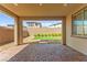 Outdoor patio area with brick pavers and gravel backyard at 767 Tallgrass St, Las Vegas, NV 89138
