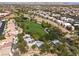 A beautiful aerial view of the property highlighting its proximity to lush green spaces and neighborhood amenities at 7837 Fort Ruby Pl, Las Vegas, NV 89128