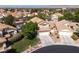 An aerial view of a home featuring a tiled roof in a suburban neighborhood at 7837 Fort Ruby Pl, Las Vegas, NV 89128