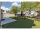Well-maintained backyard featuring lush artificial turf and a concrete patio area, perfect for outdoor relaxation and entertainment at 7837 Fort Ruby Pl, Las Vegas, NV 89128