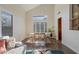 Spacious living room with hardwood floors and plenty of natural light at 7837 Fort Ruby Pl, Las Vegas, NV 89128