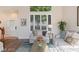 Comfortable living room with hardwood floors and a view of the front door at 7837 Fort Ruby Pl, Las Vegas, NV 89128