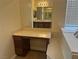 Vanity area with drawers, a mirror and ample counter space, next to a bathtub at 7934 Cape Flattery Ave, Las Vegas, NV 89147