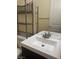 Bright bathroom features a white sink and vanity with a mirrored wall cabinet at 7934 Cape Flattery Ave, Las Vegas, NV 89147