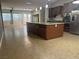 Open kitchen boasts a large island and stainless steel appliances at 7934 Cape Flattery Ave, Las Vegas, NV 89147