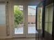 The home features double doors opening to a charming backyard patio at 7934 Cape Flattery Ave, Las Vegas, NV 89147