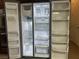 Stainless steel side-by-side refrigerator with spacious shelving and storage at 7934 Cape Flattery Ave, Las Vegas, NV 89147