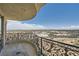A balcony with wrought iron railing offers beautiful views of the city at 9101 Alta Dr # 1203, Las Vegas, NV 89145