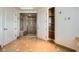 Spacious bathroom featuring a walk-in glass shower, built-in shelves, and tile flooring at 9101 Alta Dr # 1203, Las Vegas, NV 89145
