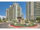 Luxury high-rise residence featuring meticulously landscaped grounds and elegant fountain, offering an upscale living experience at 9101 Alta Dr # 1203, Las Vegas, NV 89145