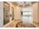 Elegant foyer with decorative glass doors, marble flooring, and intricate design, leading into a spacious interior at 9101 Alta Dr # 1203, Las Vegas, NV 89145