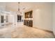 Elegant living room featuring a bar, chandelier lighting, and marble floors, ideal for entertaining guests at 9101 Alta Dr # 1203, Las Vegas, NV 89145