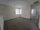 Bedroom with carpet, windows, and doorway at 9312 Gold Dove Ct, Las Vegas, NV 89178