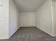 Spacious, carpeted bedroom with neutral walls at 9312 Gold Dove Ct, Las Vegas, NV 89178