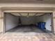 Spacious two-car garage with ample room for parking and storage, as well as a water heater at 9312 Gold Dove Ct, Las Vegas, NV 89178