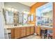 Spacious bathroom with dual sinks, vanity area, and ample counter space at 10373 Hawk Ravine St, Las Vegas, NV 89178