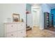 Bright entryway features tile flooring, staircase and built in cabinet at 10373 Hawk Ravine St, Las Vegas, NV 89178