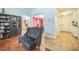 View from the entryway into the sitting room with beautiful flooring at 10373 Hawk Ravine St, Las Vegas, NV 89178