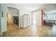 View into the hallway and sitting room from living room with sliding glass doors at 10373 Hawk Ravine St, Las Vegas, NV 89178