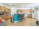 Spacious kitchen with granite countertops, stainless steel appliances, and a breakfast bar at 10373 Hawk Ravine St, Las Vegas, NV 89178