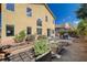 Home backyard featuring an in-ground garden, lush landscaping, patio, and BBQ at 1127 Lake Berryessa St, Henderson, NV 89002