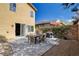 Private backyard featuring a paved patio, outdoor table, BBQ, and easy access to the home at 1127 Lake Berryessa St, Henderson, NV 89002