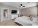 Spacious bedroom with flat screen TV, ceiling fan and bright, natural light at 1127 Lake Berryessa St, Henderson, NV 89002