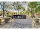 A welcome sign to the Ladera community is surrounded by trees and a rock garden at 1127 Lake Berryessa St, Henderson, NV 89002
