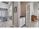 Hallway view leading to a dining area and living room featuring a convenient dry bar area at 1127 Lake Berryessa St, Henderson, NV 89002