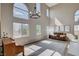 Bright living room with soaring ceilings, natural light, and stylish decor at 1127 Lake Berryessa St, Henderson, NV 89002
