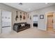 Loft area with neutral carpet and decor featuring an adjacent bedroom and bathroom at 1127 Lake Berryessa St, Henderson, NV 89002