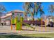Playground with a green slide and climbing wall, featuring views of the surrounding neighborhood at 1127 Lake Berryessa St, Henderson, NV 89002