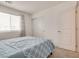 Comfortable bedroom with a storage closet, neutral walls, and soft natural light at 12110 Midnight Pine Rd # 4, Las Vegas, NV 89183