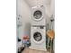 Compact laundry room with stacked washer and dryer at 12110 Midnight Pine Rd # 4, Las Vegas, NV 89183