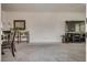 Bright living room featuring carpet and a modern media center at 12110 Midnight Pine Rd # 4, Las Vegas, NV 89183