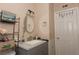 Bathroom featuring a gray vanity with modern fixtures and neutral walls at 1312 Denarius Cir, Las Vegas, NV 89101