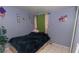 Cozy bedroom with tile floors and curtains, offering a comfortable space at 1312 Denarius Cir, Las Vegas, NV 89101