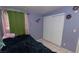 Bedroom featuring tile floors, light purple walls, and a double-door closet at 1312 Denarius Cir, Las Vegas, NV 89101