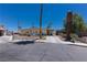 Charming single-story home with a long driveway, mature landscaping, and a well-maintained front yard at 1312 Denarius Cir, Las Vegas, NV 89101