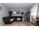 Comfortable living room featuring a plush sofa, neutral walls, and a cozy atmosphere at 1312 Denarius Cir, Las Vegas, NV 89101