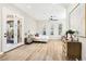Bright open main bedroom featuring hardwood floors, and multiple windows for natural lighting at 1343 Panini Dr, Henderson, NV 89052
