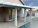 Covered patio area featuring poolside views and sliding glass doors to the home at 1367 Sun Pillars Ave, Henderson, NV 89014