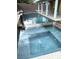 Inviting backyard pool and spa with a tile surround, a perfect space for relaxation and outdoor fun at 1367 Sun Pillars Ave, Henderson, NV 89014