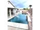 Backyard view of a refreshing pool, patio, and block wall that provides privacy at 1367 Sun Pillars Ave, Henderson, NV 89014