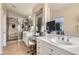 Contemporary bathroom with a glass enclosed shower, white cabinetry, and modern vanity at 1667 Sabatini Dr, Henderson, NV 89052