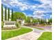 Majestic Hills entrance featuring manicured lawns, mature trees, and an elegant entry sign at 1667 Sabatini Dr, Henderson, NV 89052
