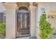 Elegant iron gate at the front entry, providing a touch of security and curb appeal to the home at 1667 Sabatini Dr, Henderson, NV 89052